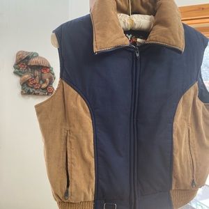VINTAGE 1970’s Nylon puffer vest with Corduroy trim. (That 70s show vibes!)